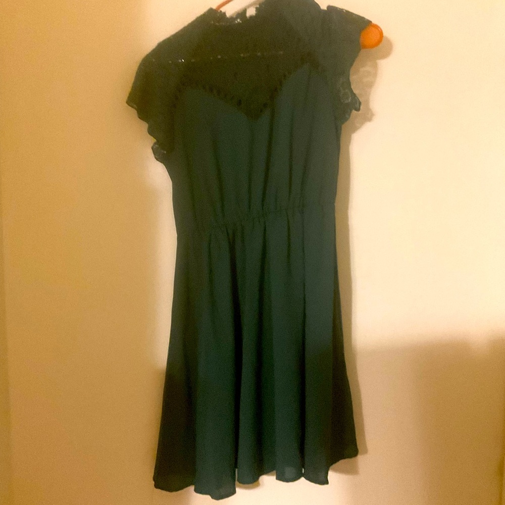 This forest green knee length dress is supper cute.
